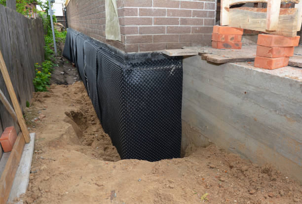Happy homeowners after waterproofing job in Rothschild